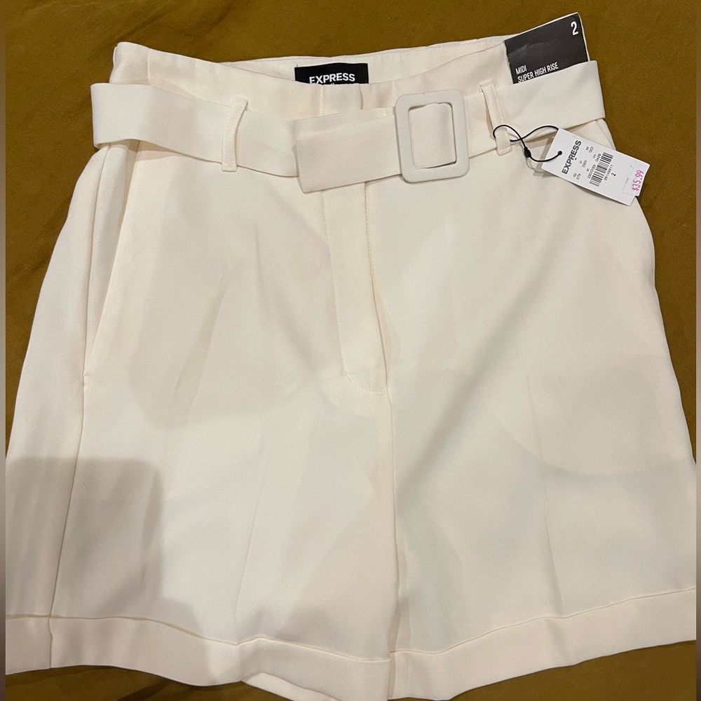 Express cream pleated belted shorts